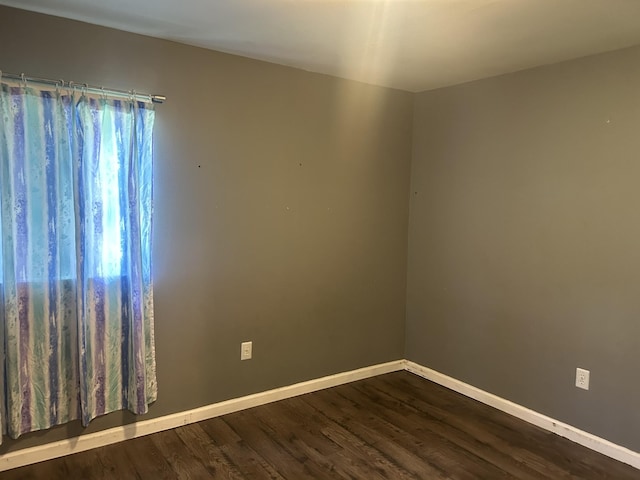 1775 Old Beech Creek Rd, Waynesboro, TN 38485 - empty room featuring baseboards and dark wood-type flooring