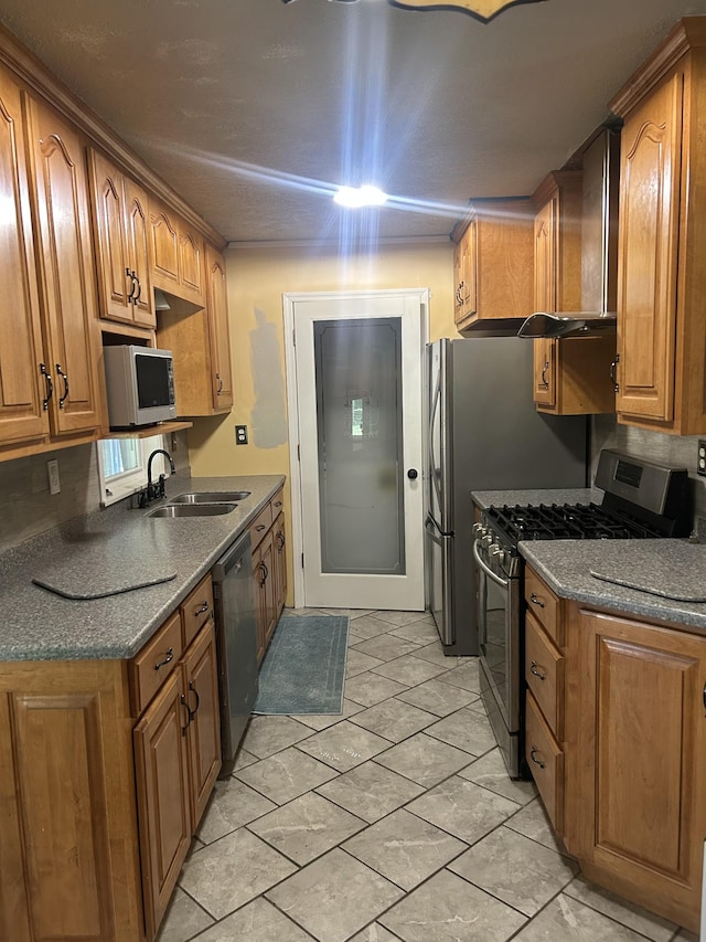 1775 Old Beech Creek Rd, Waynesboro, TN 38485 - kitchen with stainless steel appliances, brown cabinets, and dark countertops