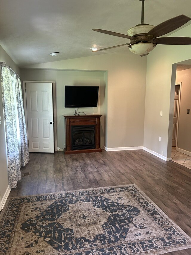 1775 Old Beech Creek Rd, Waynesboro, TN 38485 - unfurnished living room with lofted ceiling, a fireplace, a ceiling fan, and wood finished floors