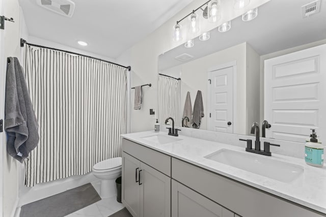 1150 Brixworth Dr, Spring Hill, TN 37174 - bathroom with double vanity and a shower with curtain