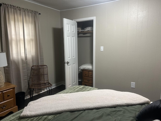 273 E Lake St, Camden, TN 38320 - bedroom with ornamental molding and a closet
