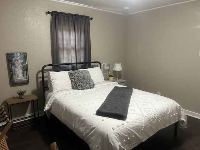 273 E Lake St, Camden, TN 38320 - bedroom featuring wood finished floors and crown molding