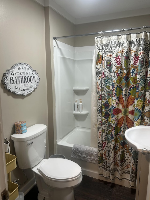 273 E Lake St, Camden, TN 38320 - full bathroom featuring wood finished floors and shower / tub combo