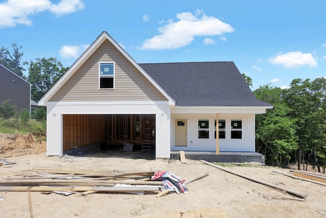12151 Bull Run, Birchwood, TN 37308 - view of front facade featuring a garage, covered porch, and roof with shingles