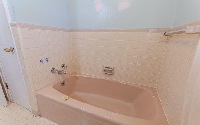 867 Lexington Hwy, Loretto, TN 38469 - full bathroom featuring a tub to relax in