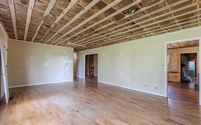 867 Lexington Hwy, Loretto, TN 38469 - unfurnished room featuring wood finished floors