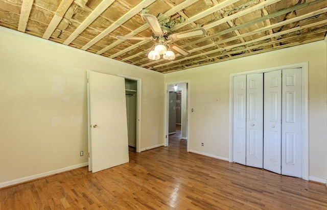 867 Lexington Hwy, Loretto, TN 38469 - unfurnished bedroom with wood finished floors and ceiling fan