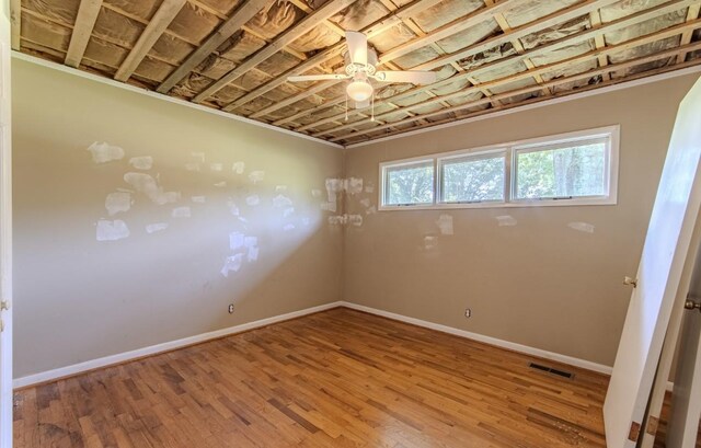 867 Lexington Hwy, Loretto, TN 38469 - empty room with light wood-type flooring and a ceiling fan