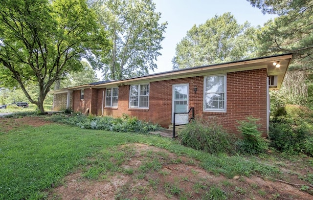 867 Lexington Hwy, Loretto, TN 38469 - single story home featuring brick siding and a front lawn