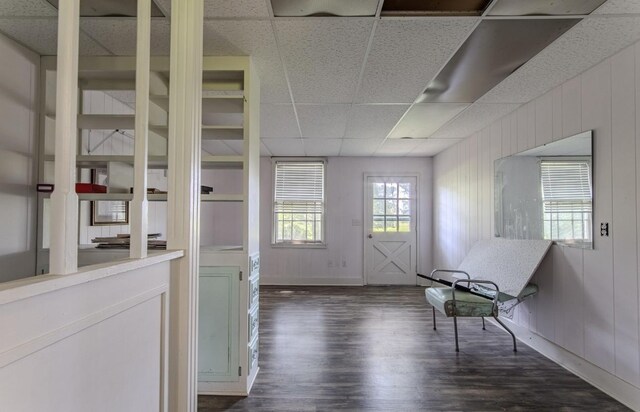 867 Lexington Hwy, Loretto, TN 38469 - interior space featuring a drop ceiling and dark wood-type flooring