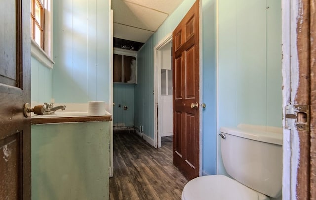 867 Lexington Hwy, Loretto, TN 38469 - half bath featuring vanity and wood finished floors