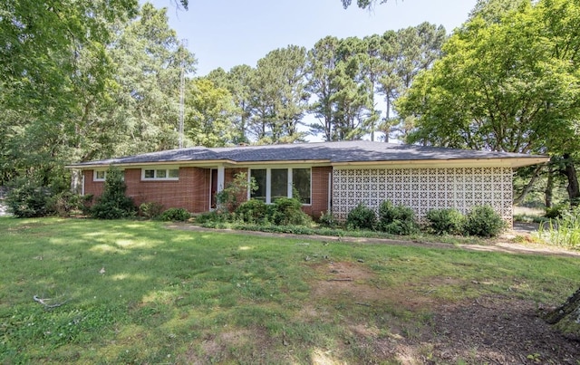 867 Lexington Hwy, Loretto, TN 38469 - ranch-style home with brick siding and a front yard