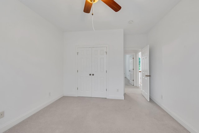7157 Chessington Dr, Fairview, TN 37062 - unfurnished bedroom with light colored carpet, a closet, and a ceiling fan