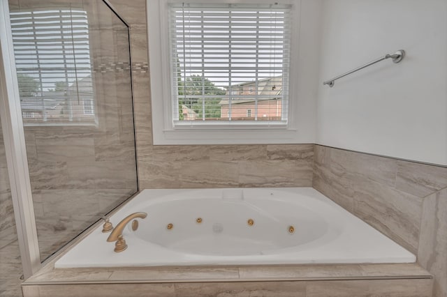 7157 Chessington Dr, Fairview, TN 37062 - full bathroom with a jetted tub and a shower