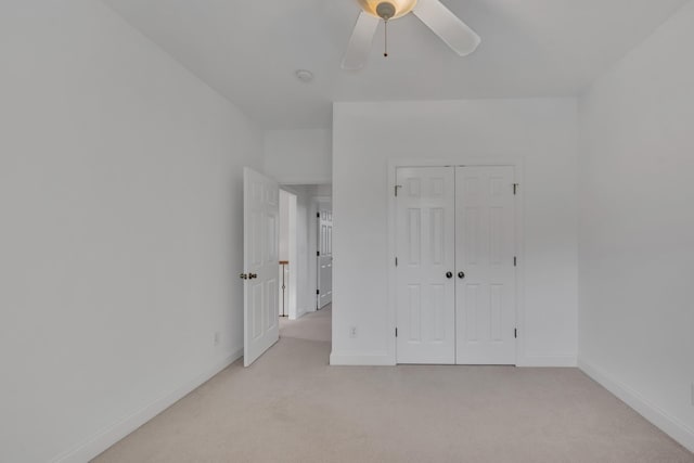 7157 Chessington Dr, Fairview, TN 37062 - unfurnished bedroom with light carpet, a closet, and a ceiling fan