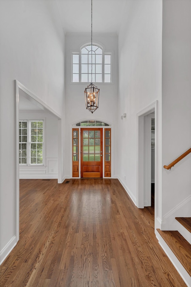 7157 Chessington Dr, Fairview, TN 37062 - foyer with a chandelier, a high ceiling, stairway, and wood finished floors