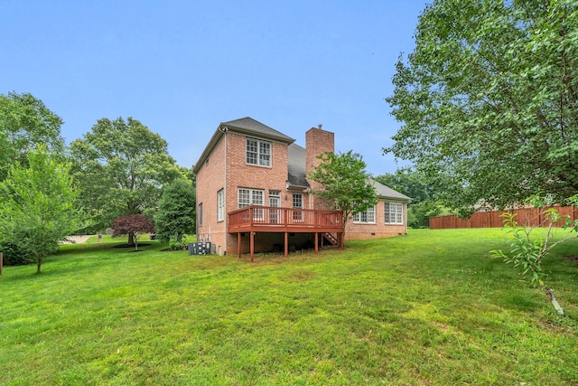 7157 Chessington Dr, Fairview, TN 37062 - back of house with brick siding, a wooden deck, and a chimney