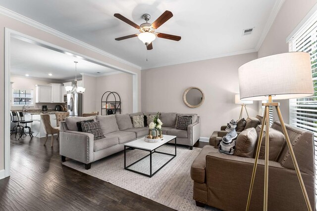 4316 Summercrest Blvd Unit 104, Antioch, TN 37013 - living area featuring a ceiling fan, wood finished floors, a chandelier, crown molding, and recessed lighting