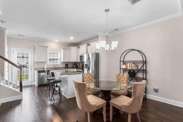 4316 Summercrest Blvd Unit 104, Antioch, TN 37013 - dining area with a chandelier, stairway, ornamental molding, dark wood-style floors, and recessed lighting