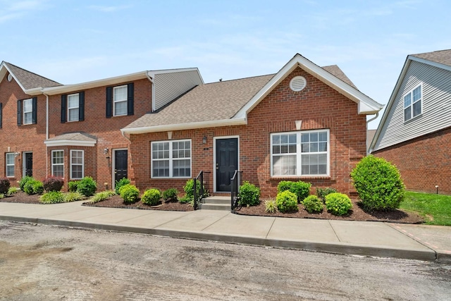1101 Downs Blvd Unit 112, Franklin, TN 37064 - view of front facade featuring brick siding and roof with shingles
