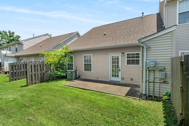 1101 Downs Blvd Unit 112, Franklin, TN 37064 - rear view of house featuring roof with shingles and a patio area