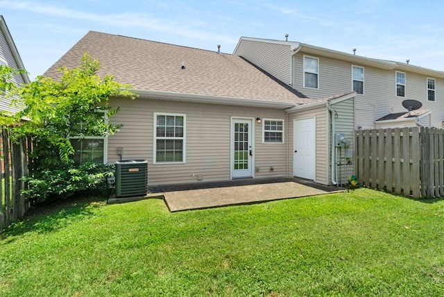 1101 Downs Blvd Unit 112, Franklin, TN 37064 - back of property with a patio area and roof with shingles