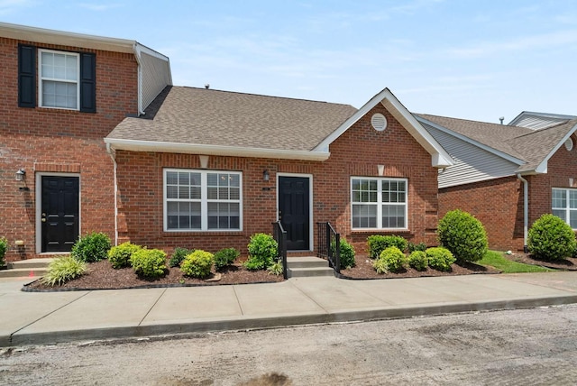 1101 Downs Blvd Unit 112, Franklin, TN 37064 - traditional-style home with brick siding and a shingled roof