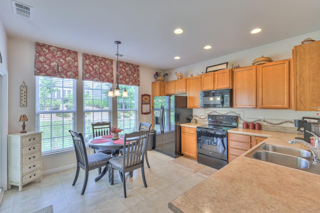 403 Independence St, Mount Juliet, TN 37122 - kitchen with black appliances, light countertops, recessed lighting, pendant lighting, and a chandelier