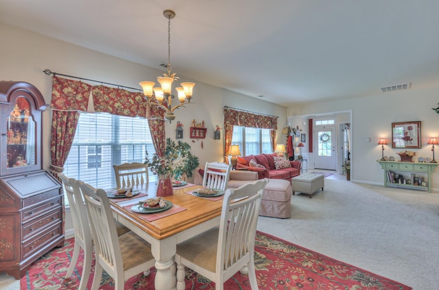 403 Independence St, Mount Juliet, TN 37122 - carpeted dining area featuring a chandelier