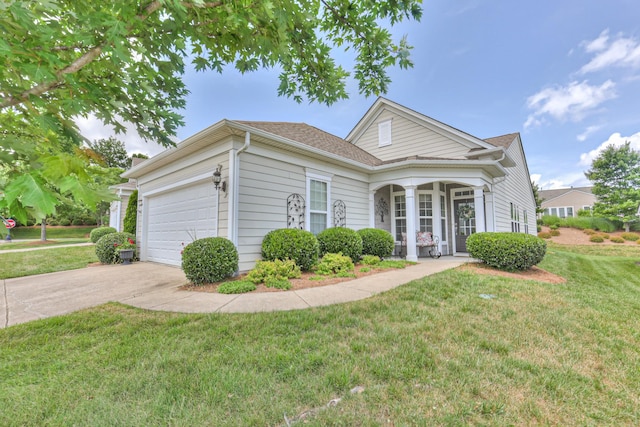 403 Independence St, Mount Juliet, TN 37122 - view of front facade featuring a front lawn, a garage, concrete driveway, and roof with shingles