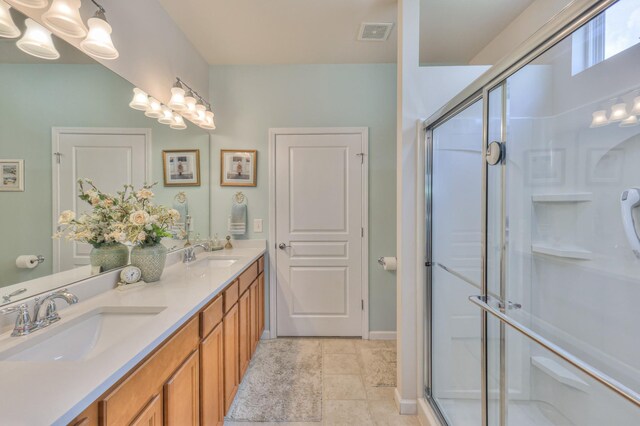 403 Independence St, Mount Juliet, TN 37122 - full bathroom with double vanity, a shower stall, and a chandelier