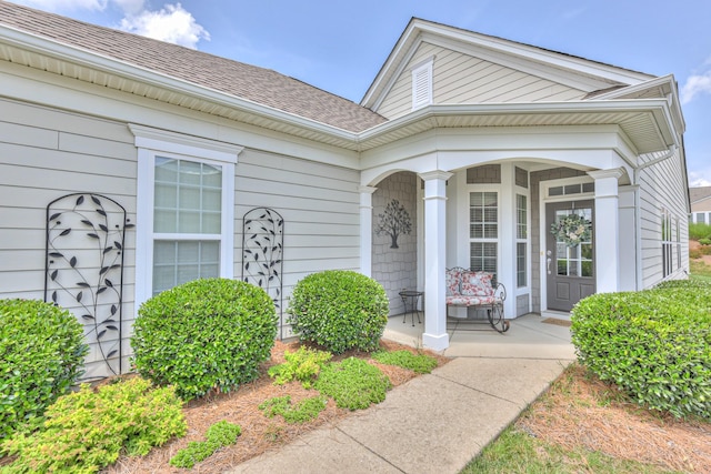 403 Independence St, Mount Juliet, TN 37122 - view of exterior entry featuring a porch and roof with shingles