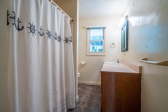 399 Indian Creek Rd, Hohenwald, TN 38462 - bathroom with vanity, a shower with shower curtain, and stone finish flooring