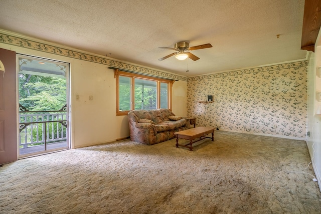 399 Indian Creek Rd, Hohenwald, TN 38462 - living area with carpet floors, a ceiling fan, a textured ceiling, and wallpapered walls