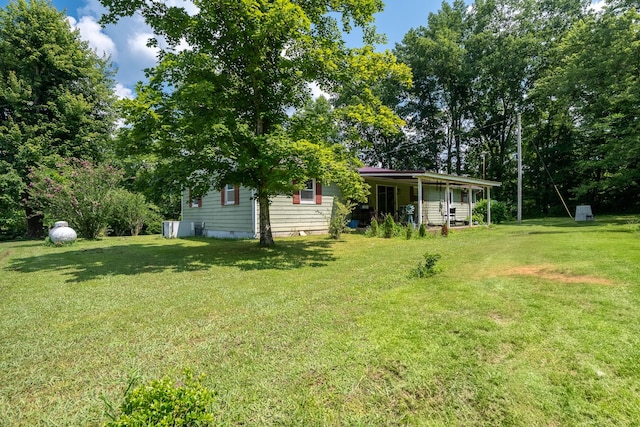 399 Indian Creek Rd, Hohenwald, TN 38462 - view of grassy yard