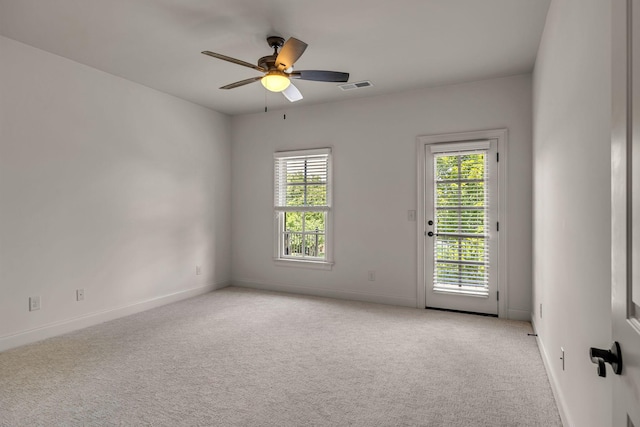 1353 Eliot Rd, Franklin, TN 37064 - spare room featuring healthy amount of natural light, light carpet, and a ceiling fan