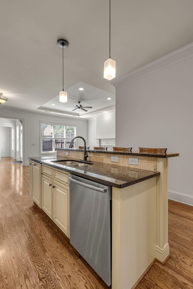 1353 Eliot Rd, Franklin, TN 37064 - kitchen with dishwasher, ornamental molding, a tray ceiling, cream cabinets, and a ceiling fan