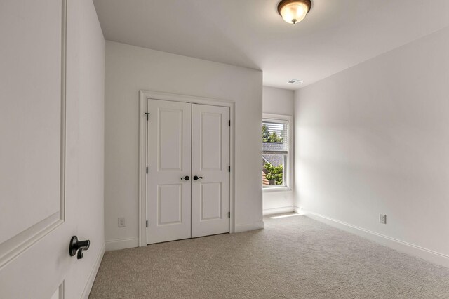 1353 Eliot Rd, Franklin, TN 37064 - unfurnished bedroom with carpet and a closet