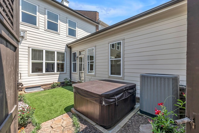 1353 Eliot Rd, Franklin, TN 37064 - back of property featuring a hot tub and a lawn