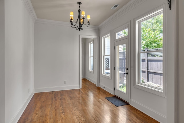 1353 Eliot Rd, Franklin, TN 37064 - entryway featuring a chandelier, plenty of natural light, wood finished floors, and crown molding