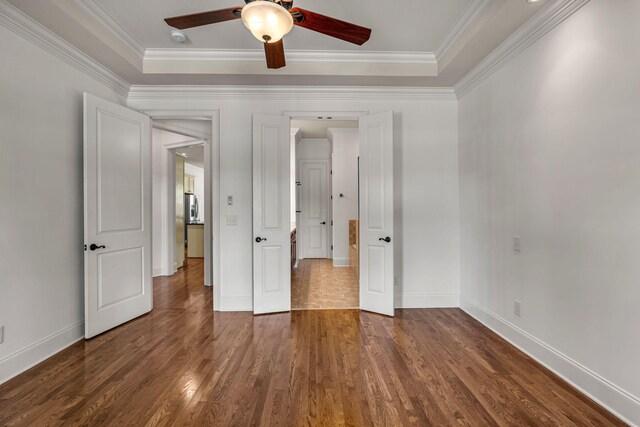 1353 Eliot Rd, Franklin, TN 37064 - unfurnished bedroom with wood finished floors, crown molding, and a ceiling fan