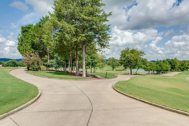 1353 Eliot Rd, Franklin, TN 37064 - view of property's community with a lawn, view of wooded area, and golf course view