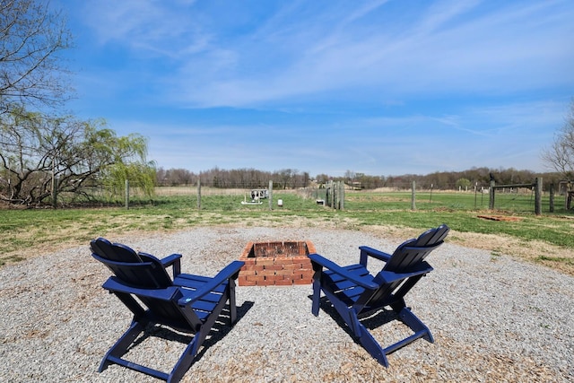 3717 Atkins Rd, Cedar Hill, TN 37032 - view of yard featuring a fire pit and a view of countryside