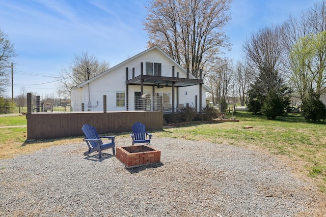 3717 Atkins Rd, Cedar Hill, TN 37032 - view of front of house with a fire pit and a front lawn