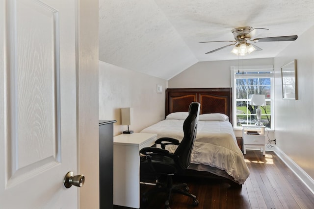 3717 Atkins Rd, Cedar Hill, TN 37032 - bedroom with vaulted ceiling, wood-type flooring, a textured ceiling, a desk, and a ceiling fan
