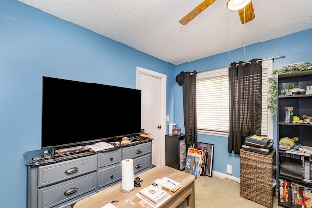 1053 Heritage Dr, Madison, TN 37115 - home office with light carpet, a ceiling fan, and a textured ceiling