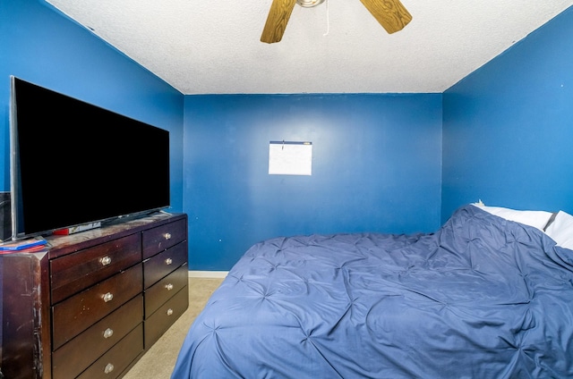 1053 Heritage Dr, Madison, TN 37115 - bedroom with light carpet, ceiling fan, and a textured ceiling