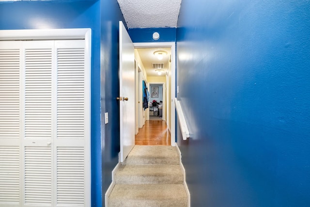 1053 Heritage Dr, Madison, TN 37115 - hall featuring a textured ceiling and carpet