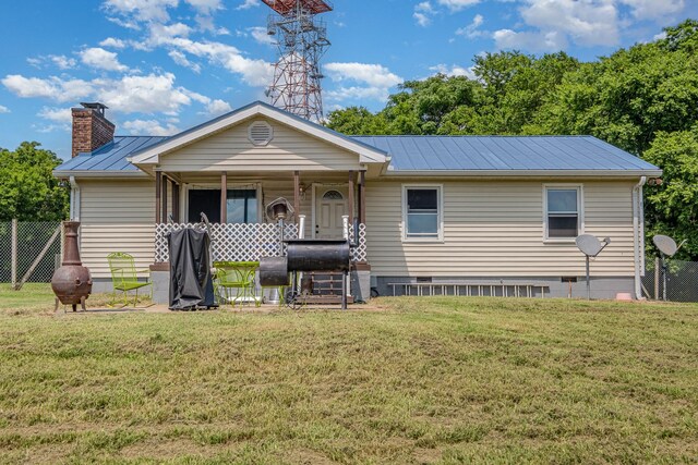 6857 Pulltight Hill Rd, College Grove, TN 37046 - view of front facade featuring a metal roof, a chimney, a standing seam roof, crawl space, and a porch