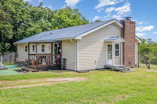6857 Pulltight Hill Rd, College Grove, TN 37046 - back of property featuring a metal roof, a chimney, and crawl space